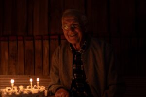 Celebrant with his cake